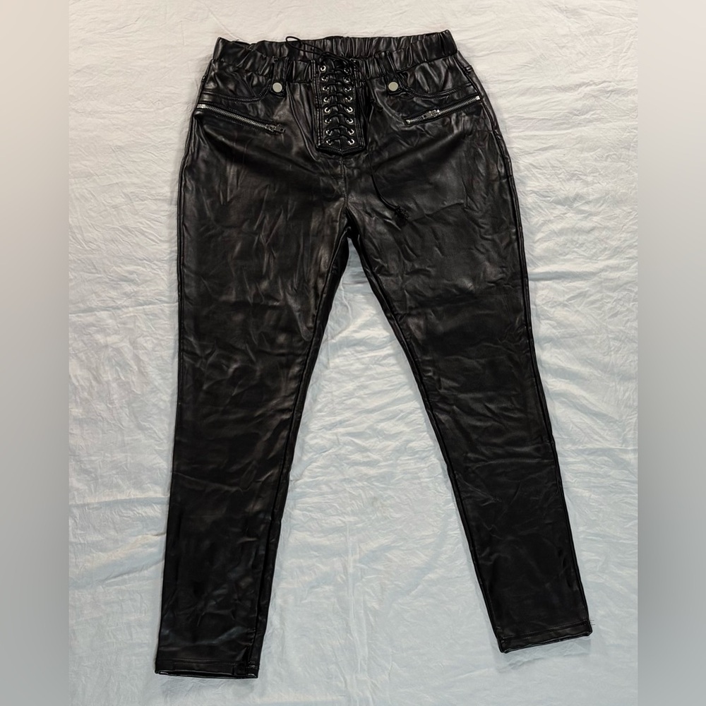 AKIRA Black Faux Leather High Rise Lace-Up Leggings.
